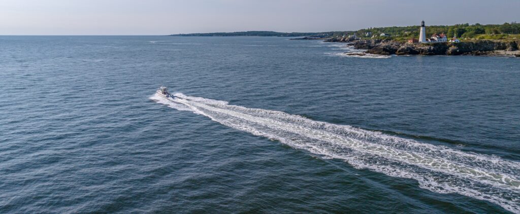 Fore River Sports Fishing Boat Passing Portland Head Light, Peter G Morneau Photography